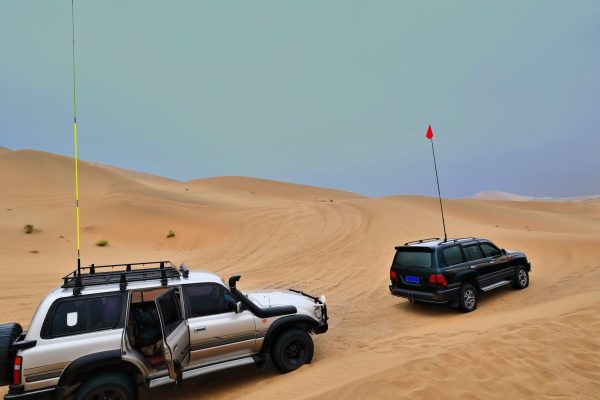 1058-gray-green-tourist-off-road-cars-sand-badain-jaran-sector-gobi-desert-nei-mongol-china-scaled-rhmwx7gzo0rtmf12r6bi70608ffm6d03k46r7tt890