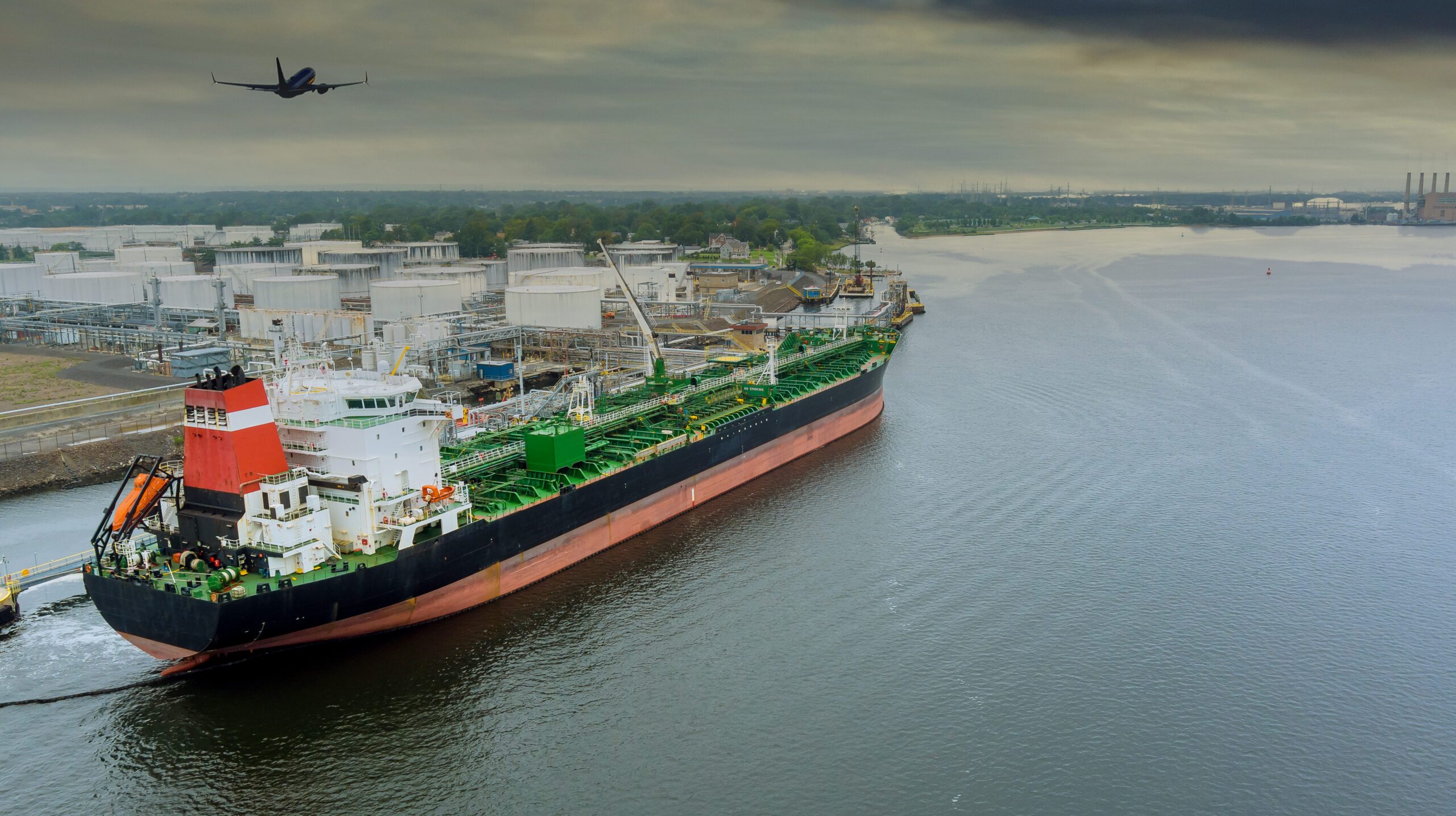 Crude oil tanker is uploading in the operation port terminal