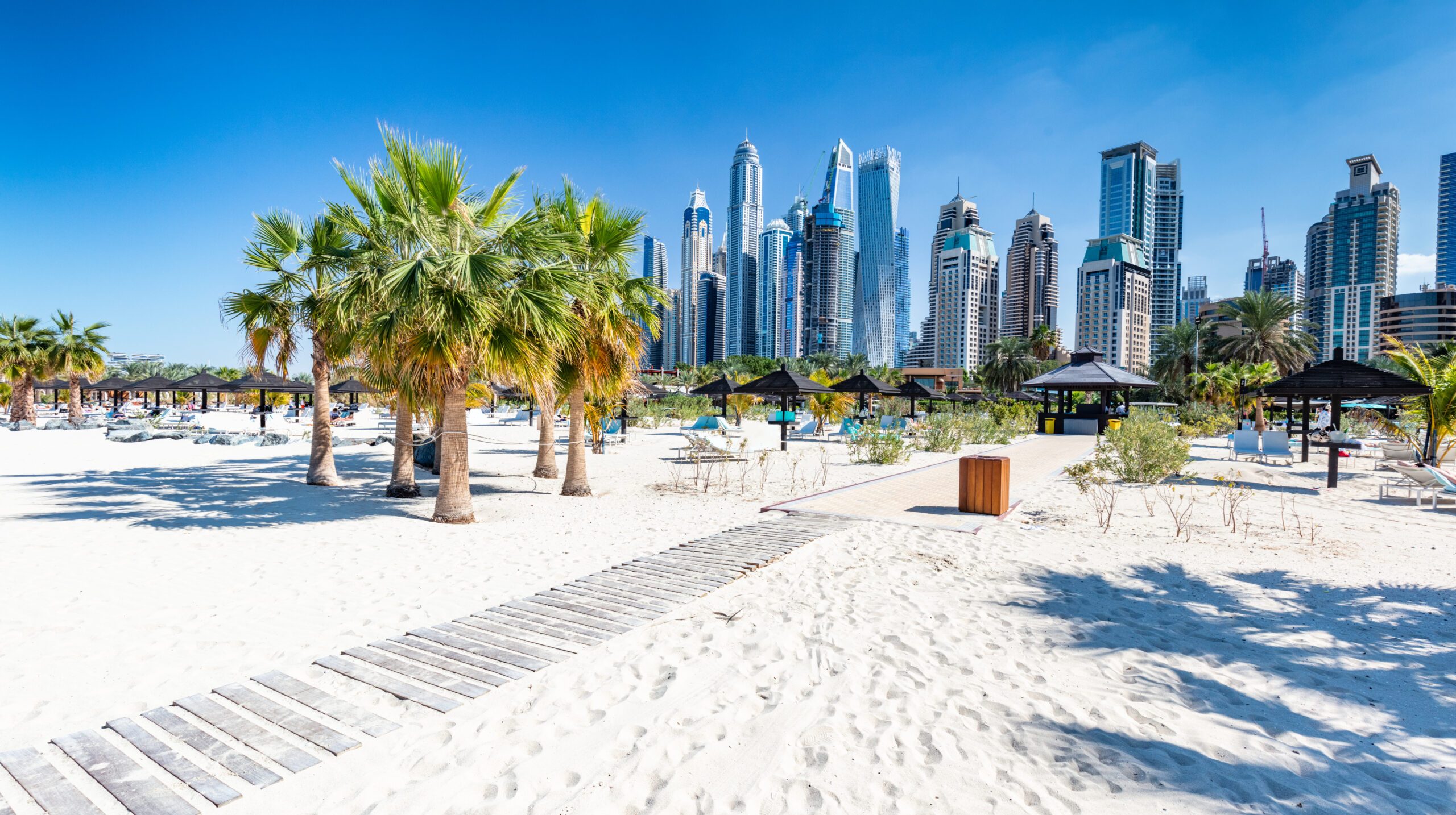Dubai jumeirah beach with marina skyscrapers in UAE. Popular public JBR beach