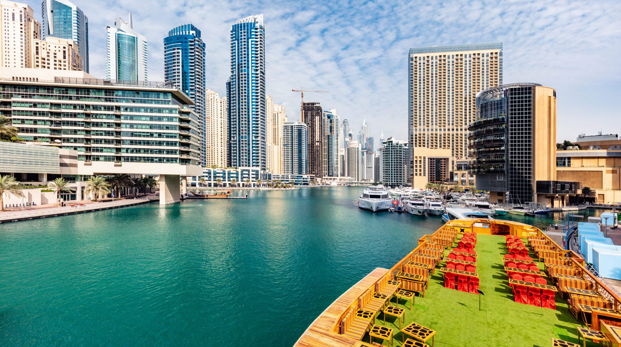Dubai marina skyline in UAE. High-rise residential buildings, business skyscrapers