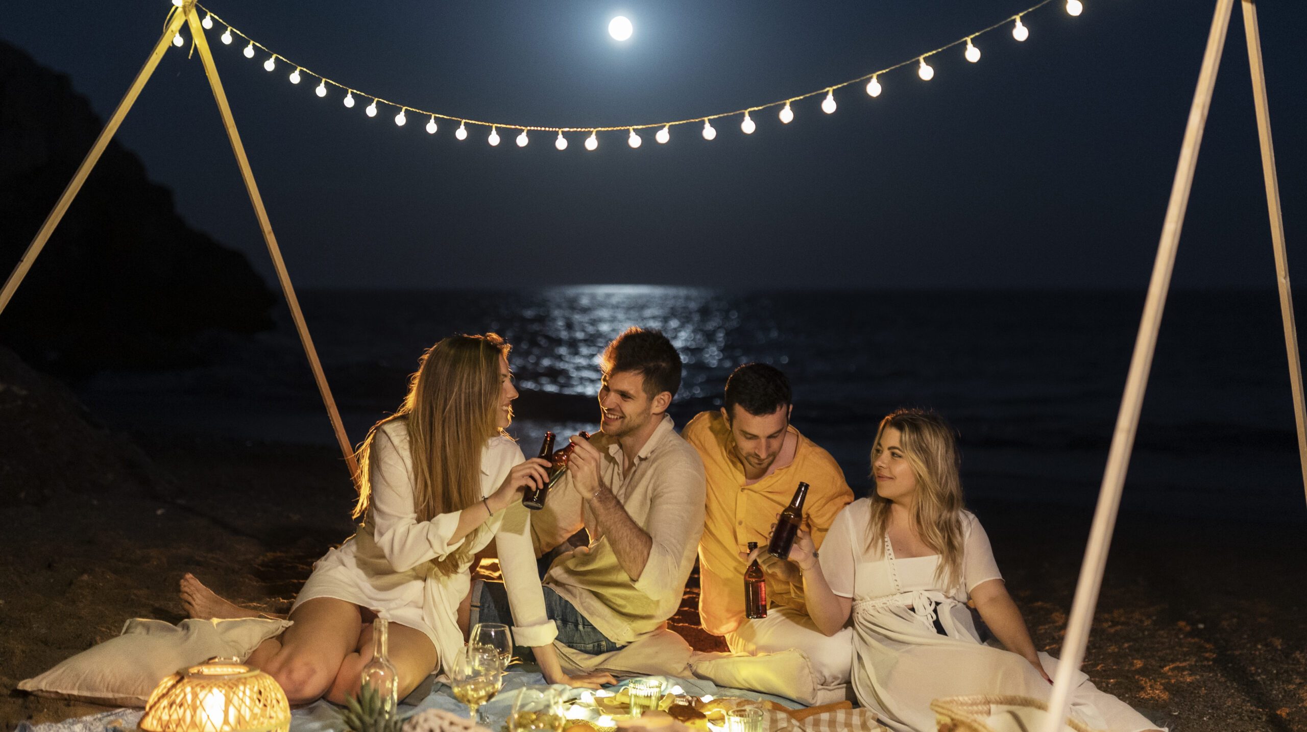 friends-night-beach-with-beer-food (1)