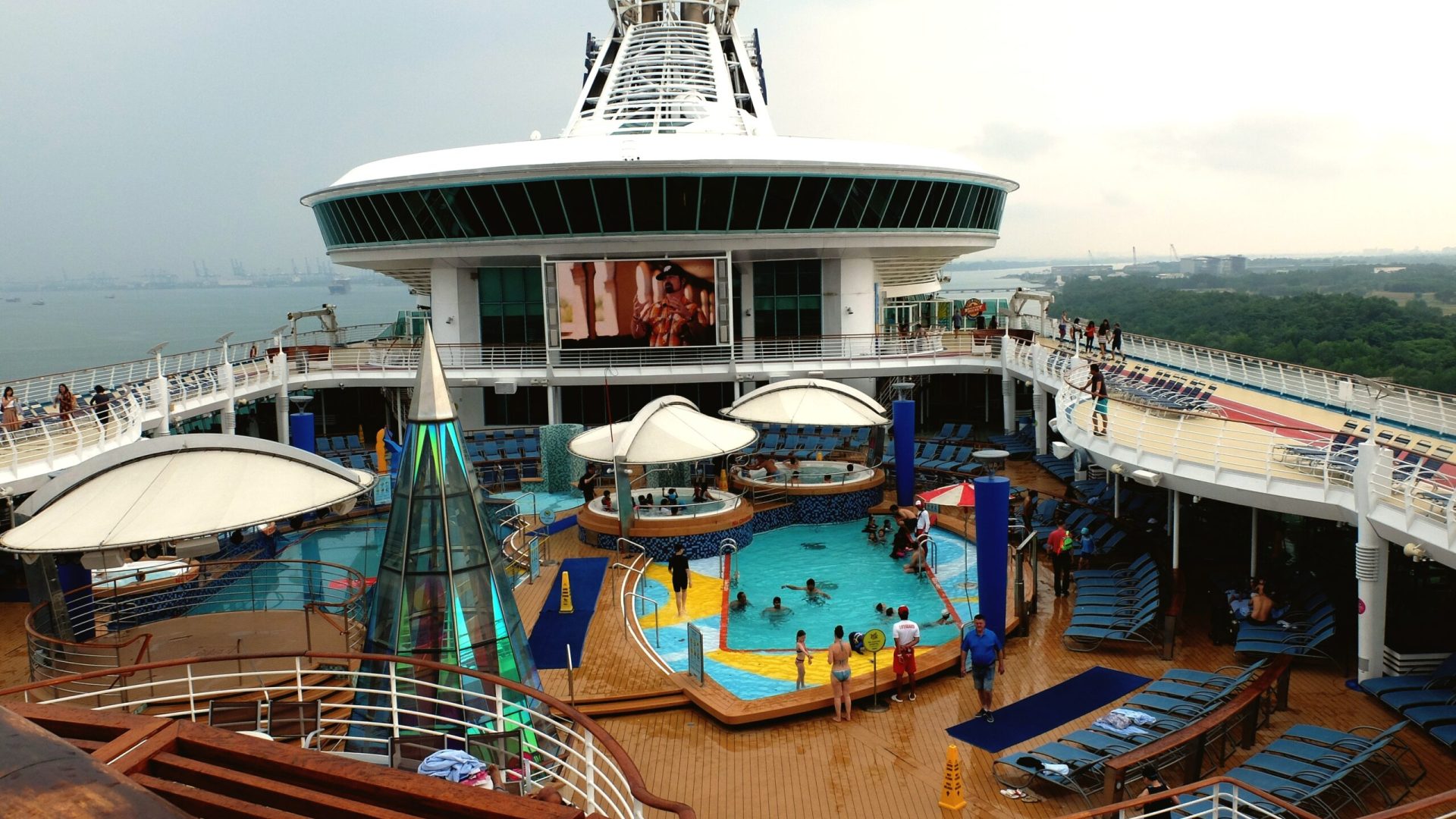 high-angle-view-people-by-swimming-pool-cruise-ship