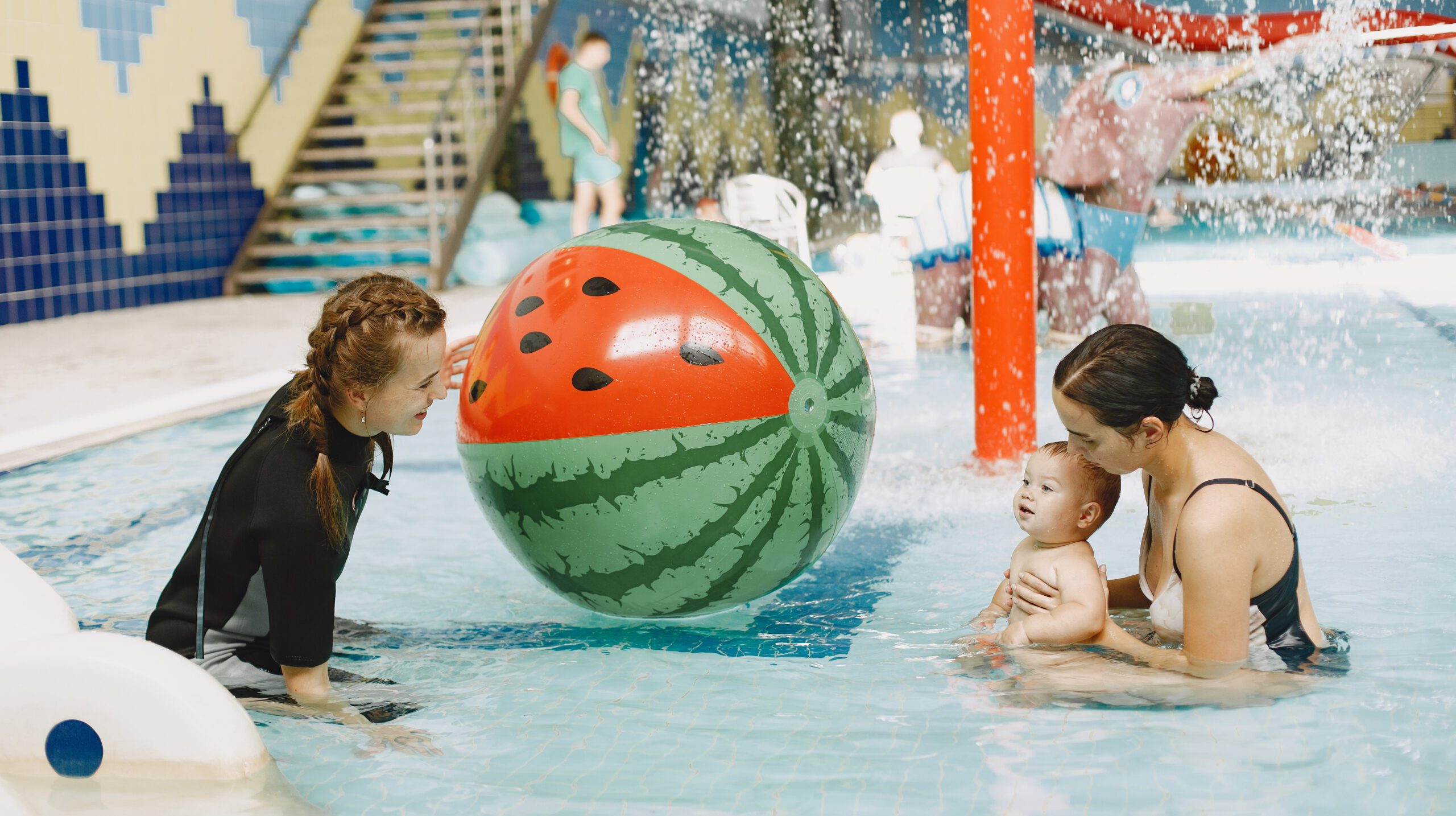 Little cute baby boy. Instructor with kid. Mother with son.