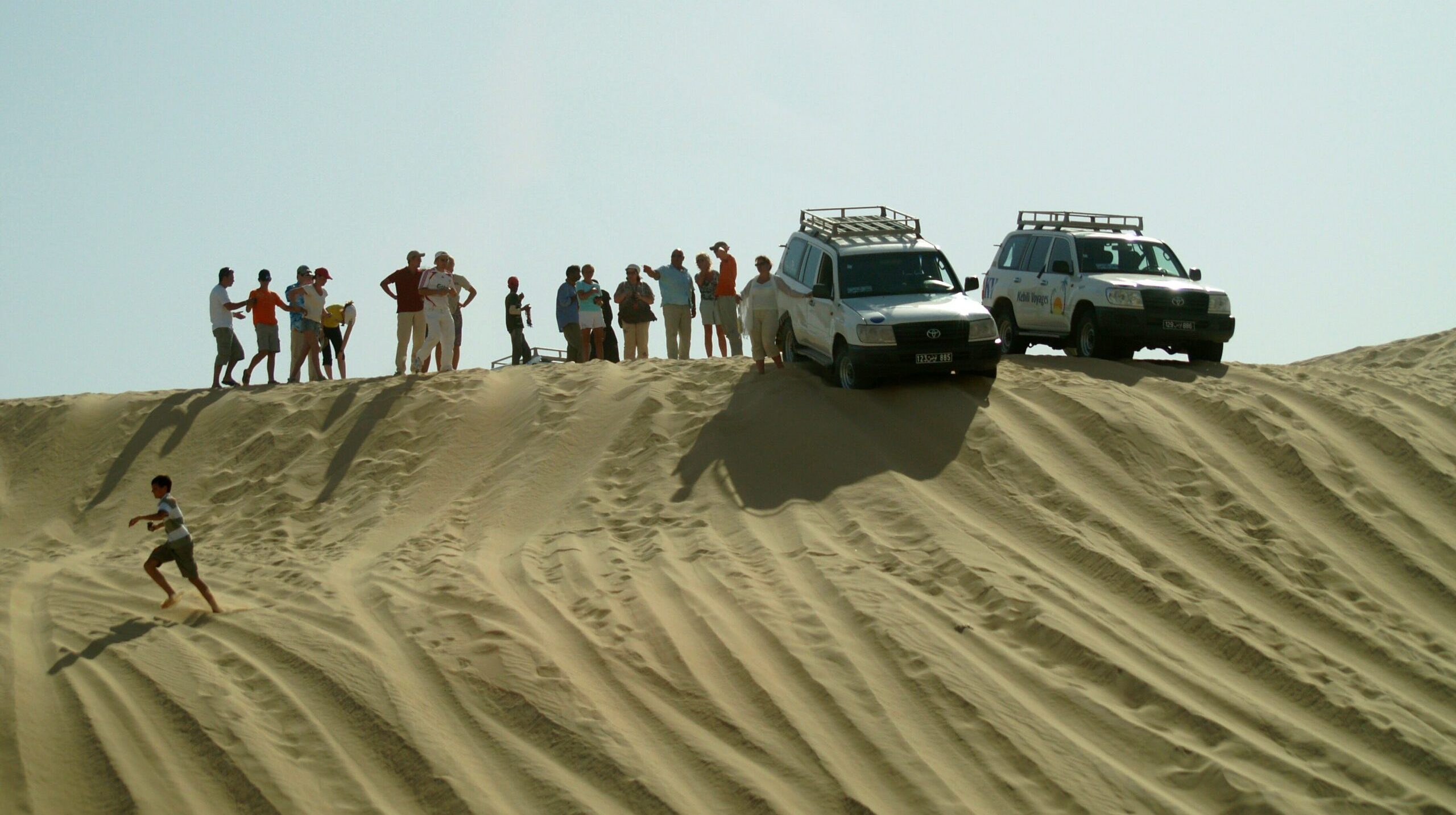 low-angle-view-jeep-desert-against-sky