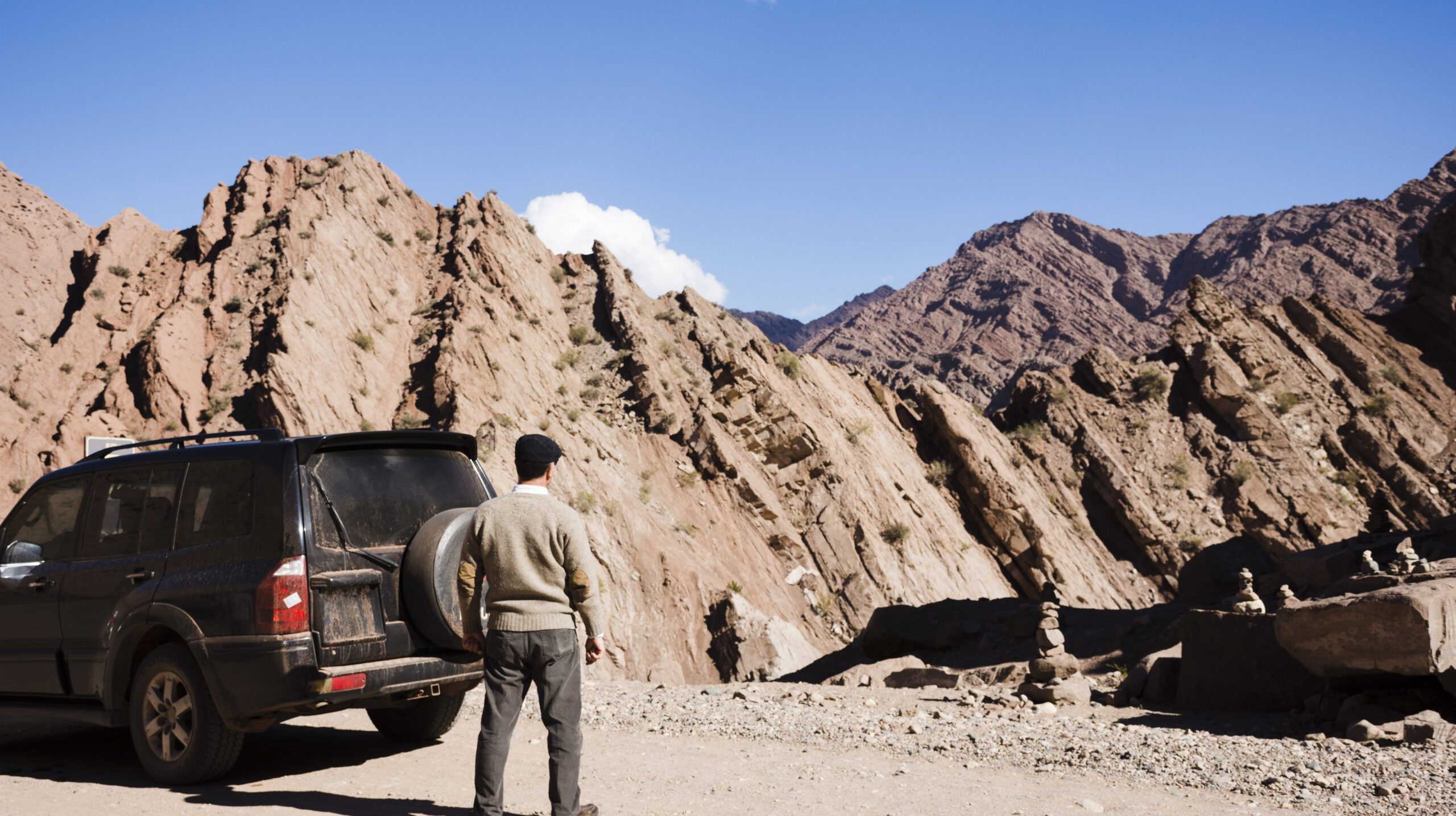 man-enjoying-mountain-view