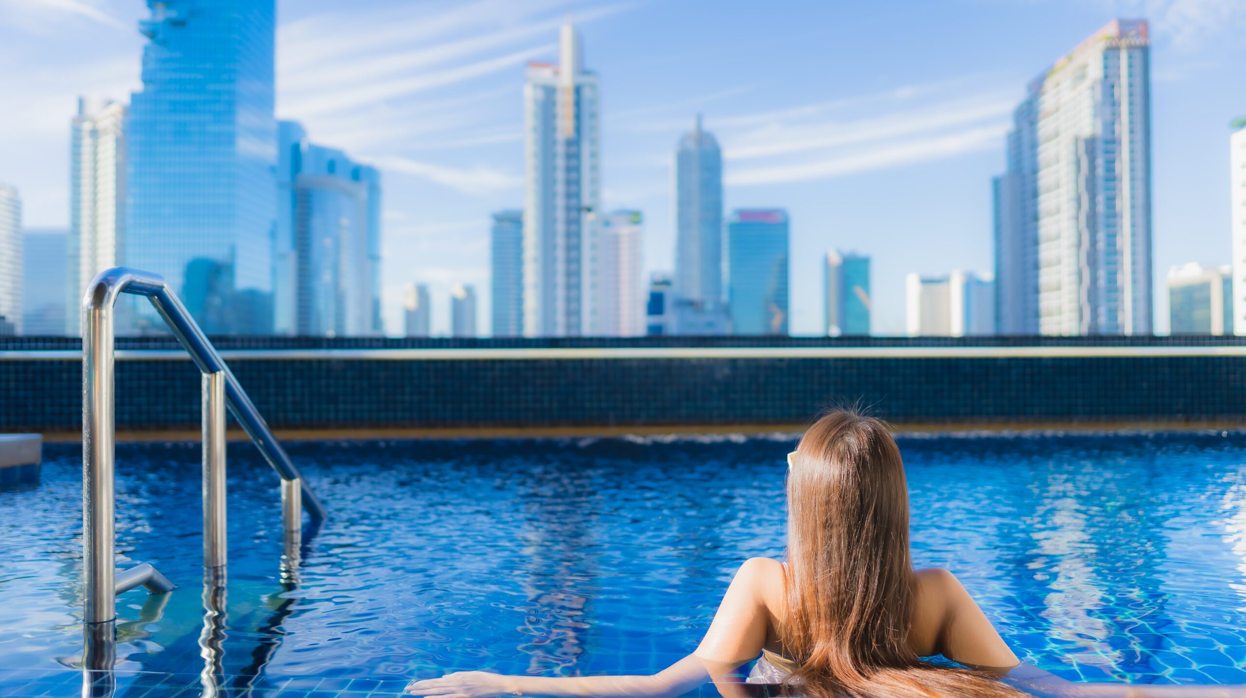 Portrait beautiful young asian woman relax leisure enjoy around outdoor swimming pool in vacation