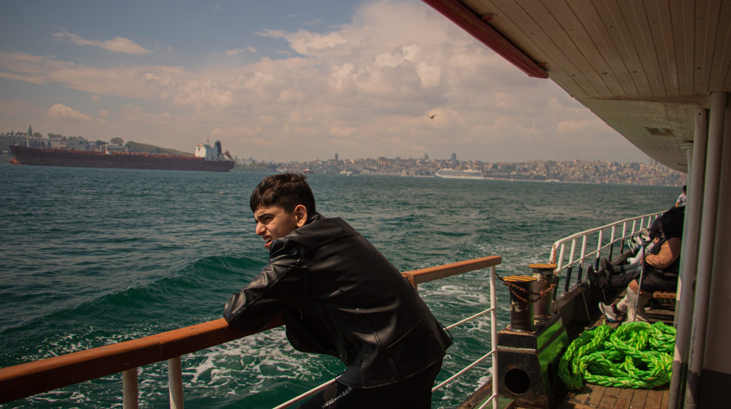 rear-view-man-standing-sea-against-sky-sunset