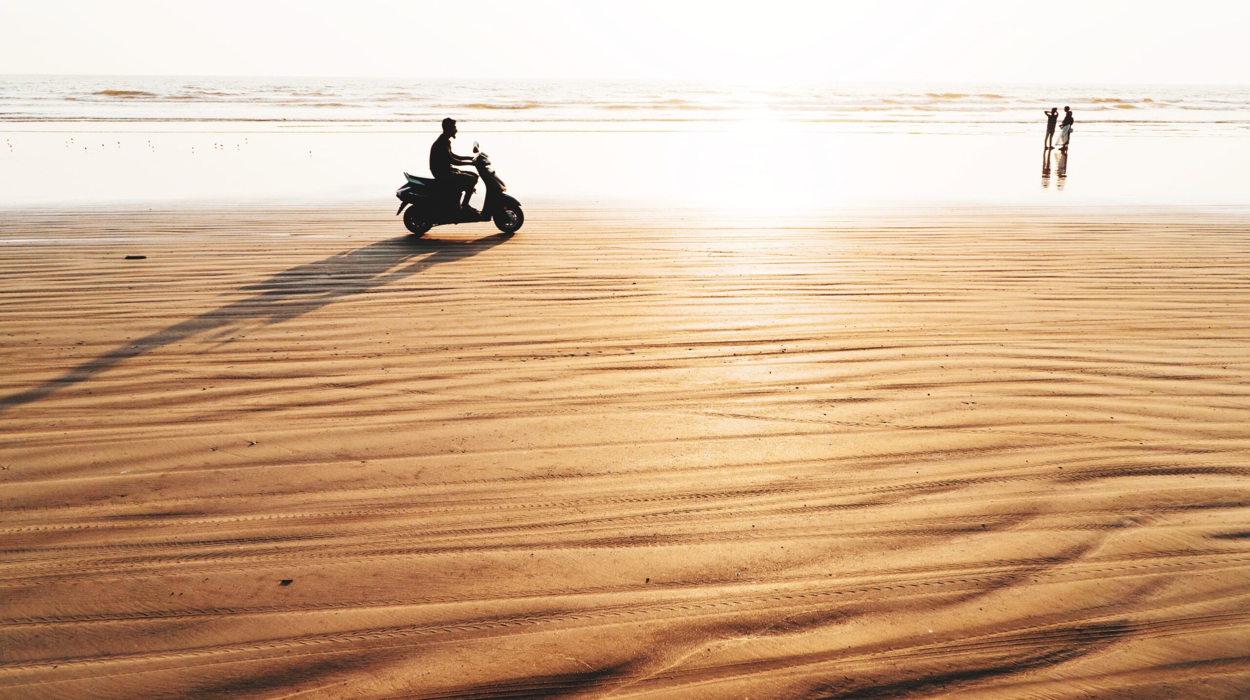 scooter-ride-along-sea-shore