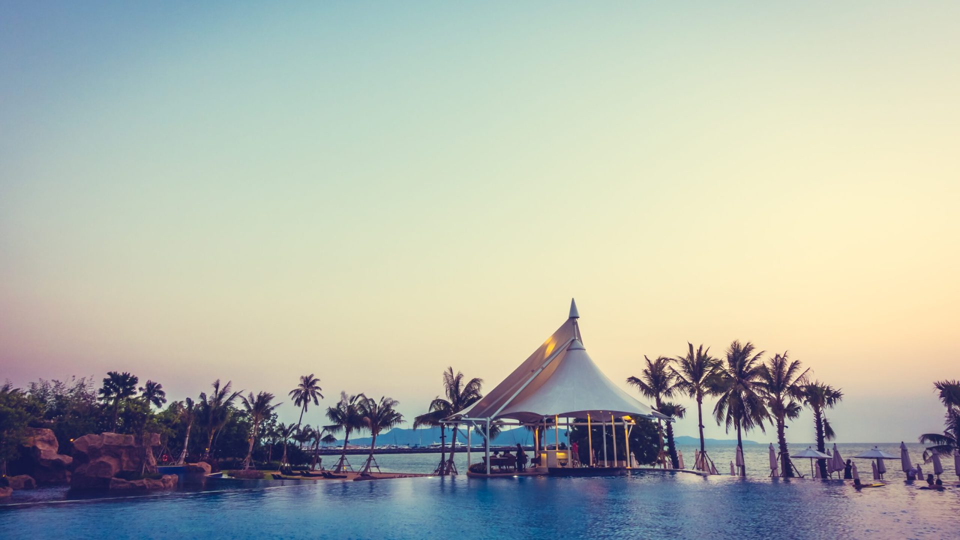 Beautiful luxury swimming pool in hotel pool resort - Vintage Filter and boost up color Processing