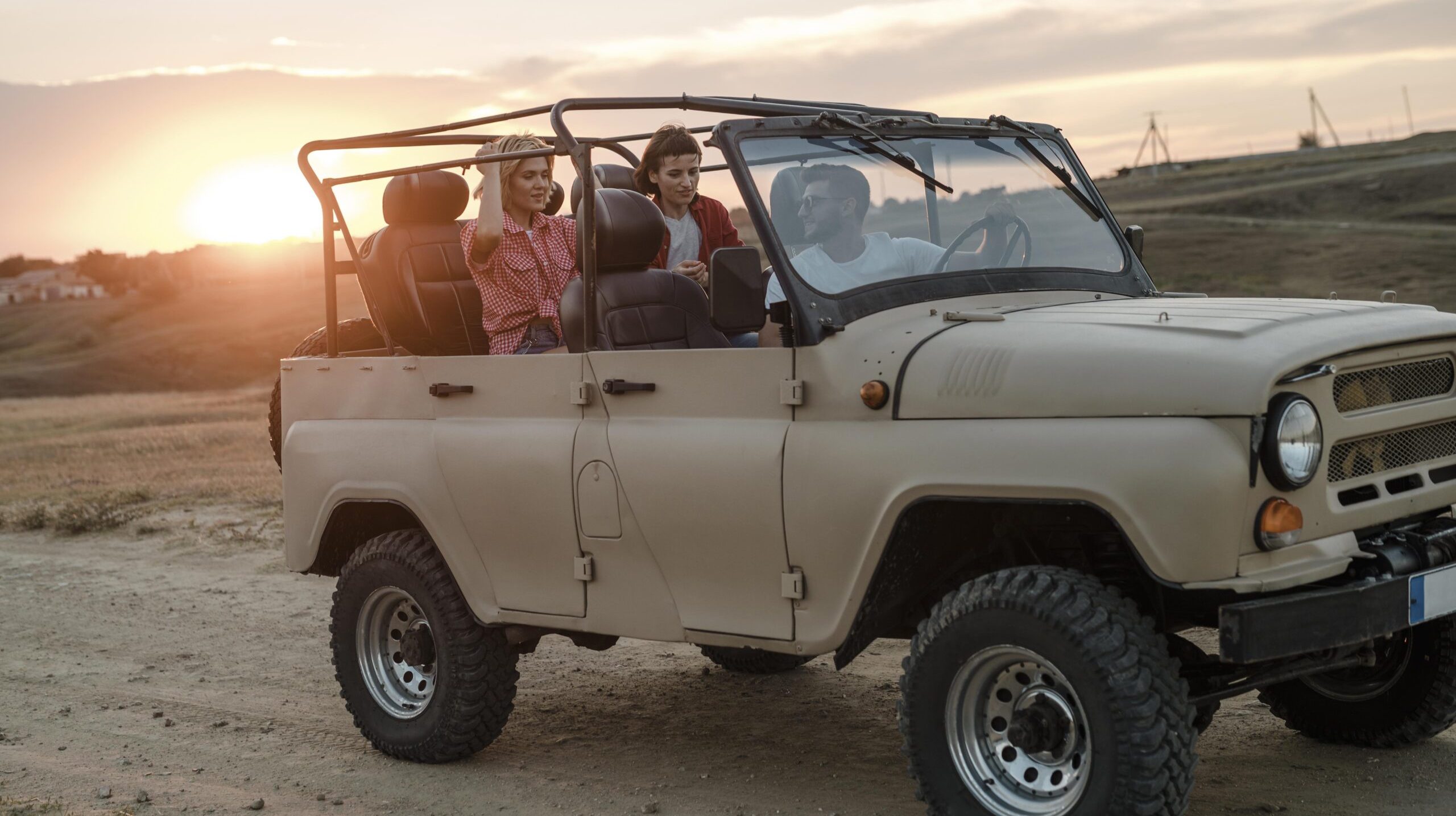 three-friends-traveling-together-by-car