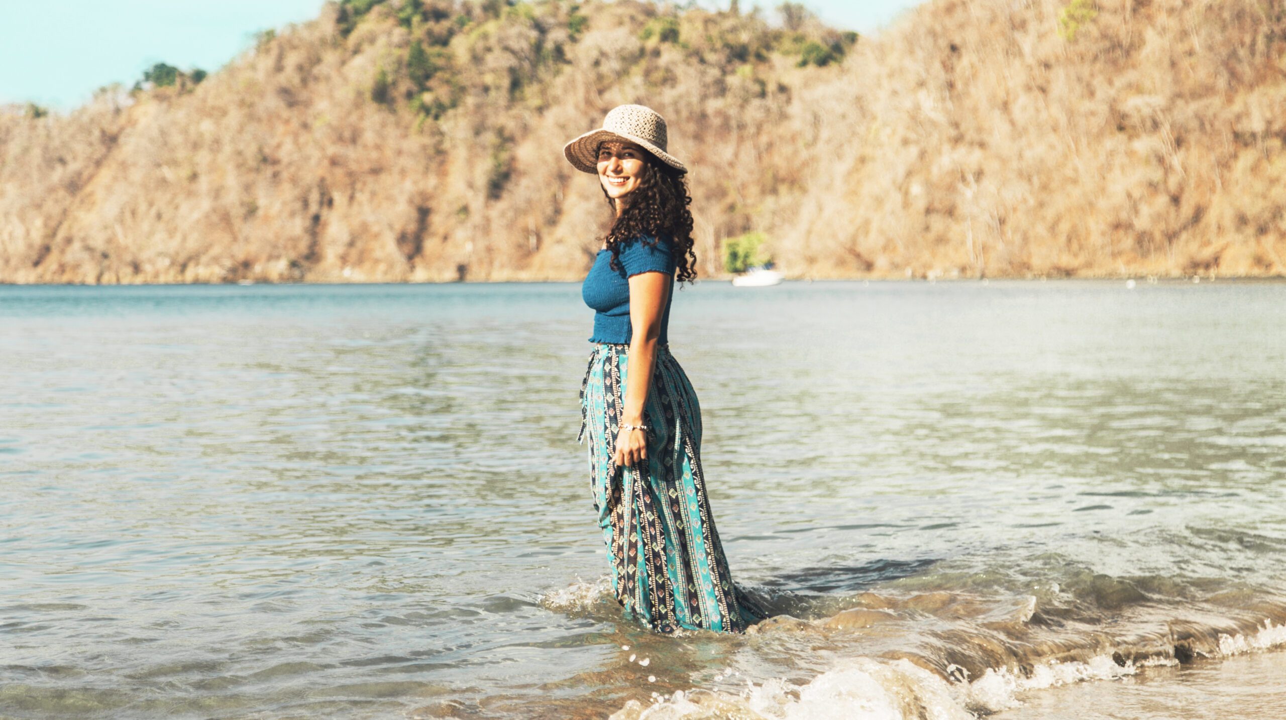 woman-standing-sea-water