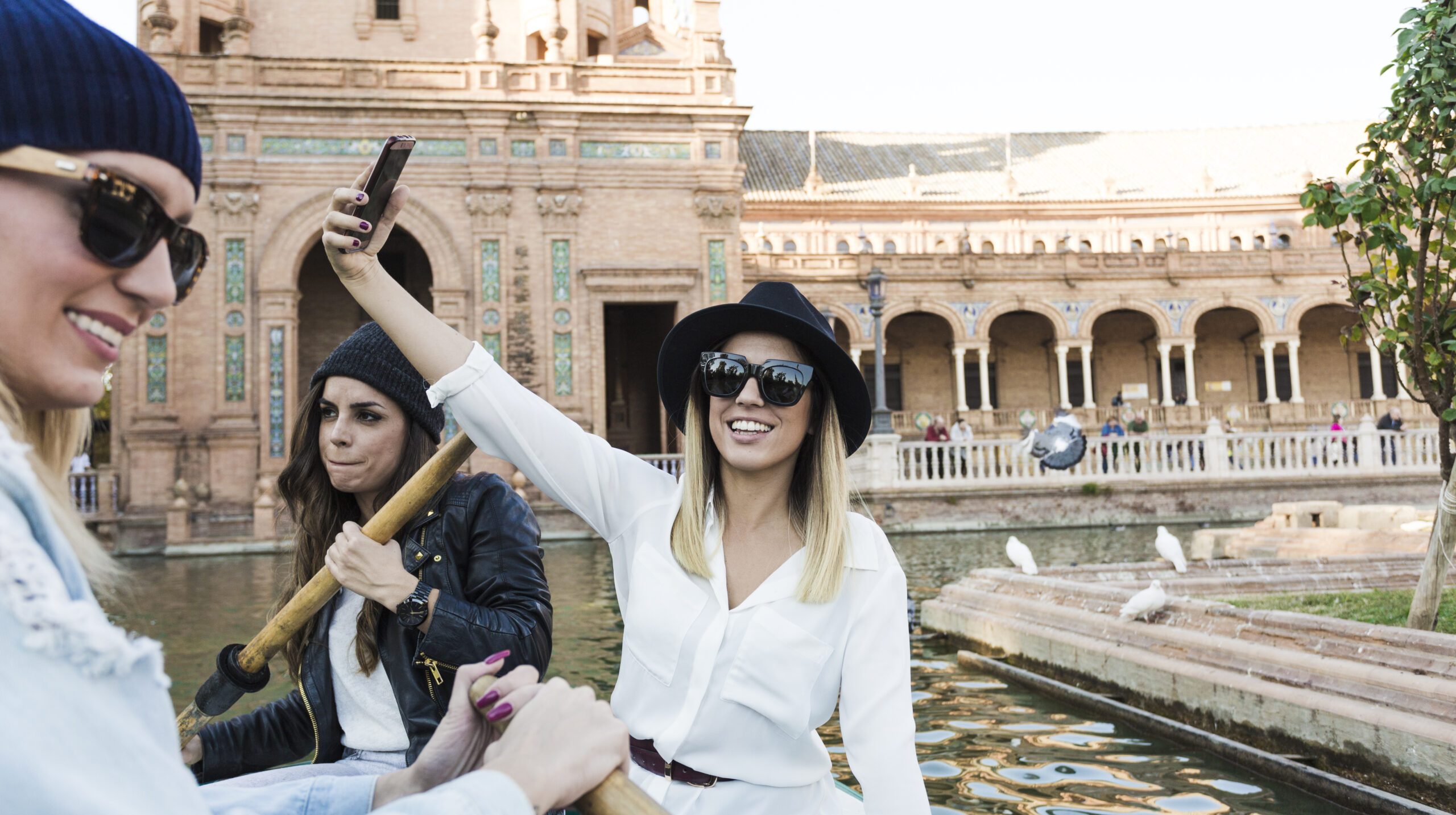 women-boat-taking-selfie
